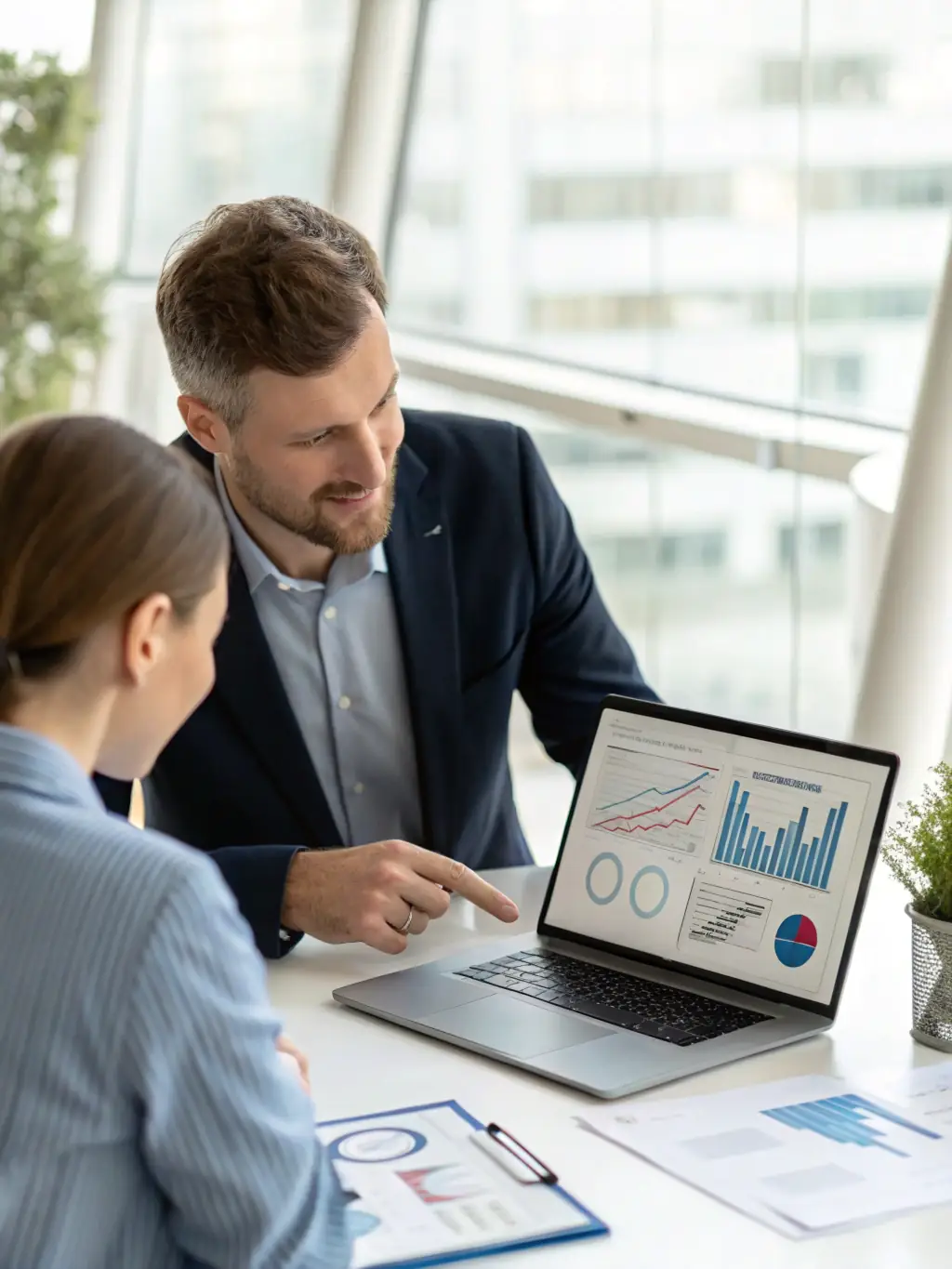 An experienced financial advisor explaining the benefits of a life insurance policy to a client, showcasing expertise and guidance in life insurance planning.