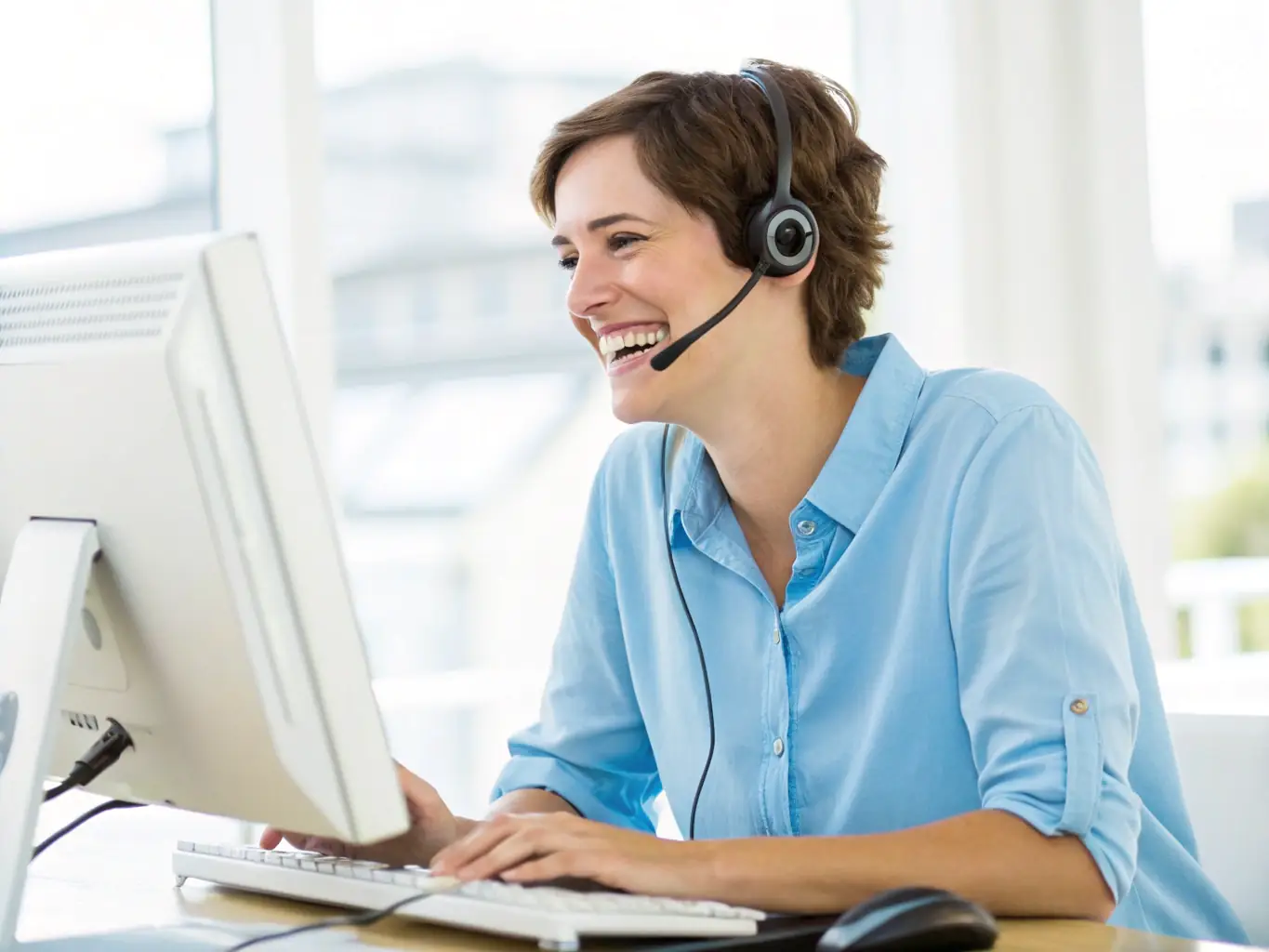 A friendly customer service representative assisting a client over the phone, showcasing ClinRoute Diagnostic Logistics' commitment to providing excellent customer support and addressing client inquiries promptly.
